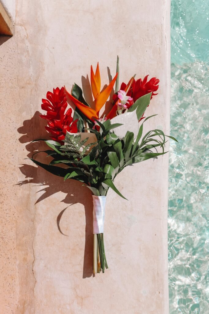 Beautiful orange and red flower bouquet for villa delivery